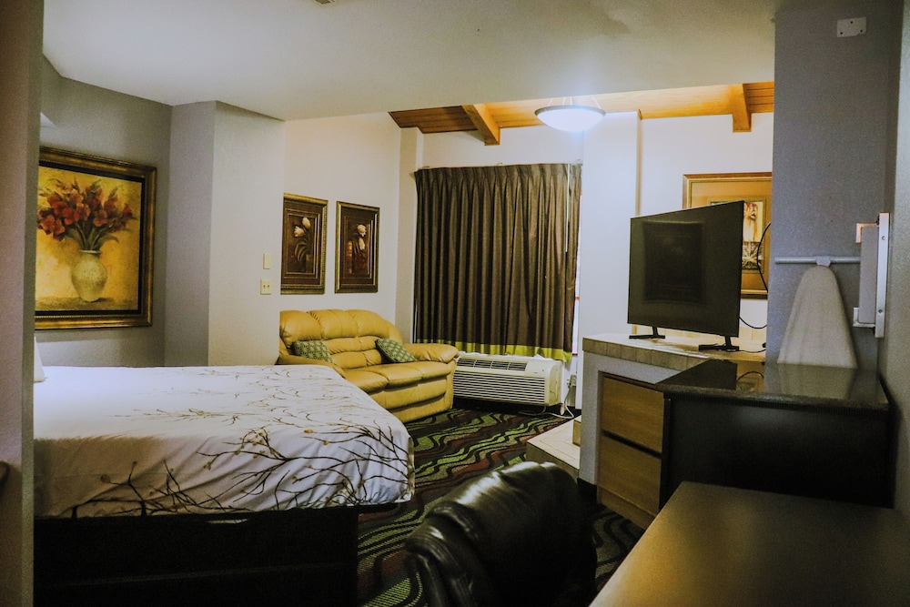 جناح تنفيذي بسرير كينج بحوض جاكوزي، Apple Tree Inn and Suites 4/10