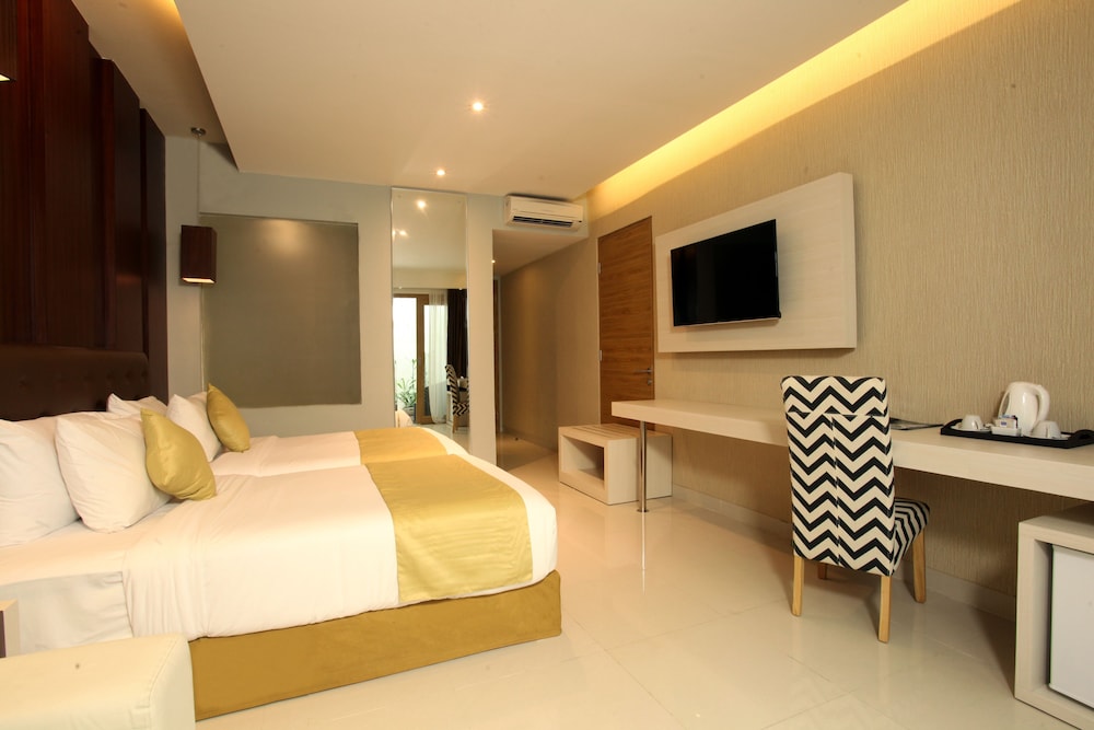 غرفة ديلوكس بسرير كينج، Tonys Villas and Resort Seminyak Bali 5/8