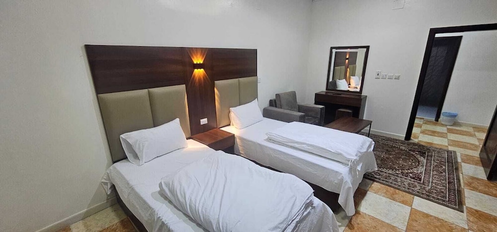 شقة بسرير مزدوج وسريرين منفصلين بغرفتي نوم، العييري للوحدات السكنية 3(Al Eairy Furnished Apartments - Al Bahah 3) 5/9