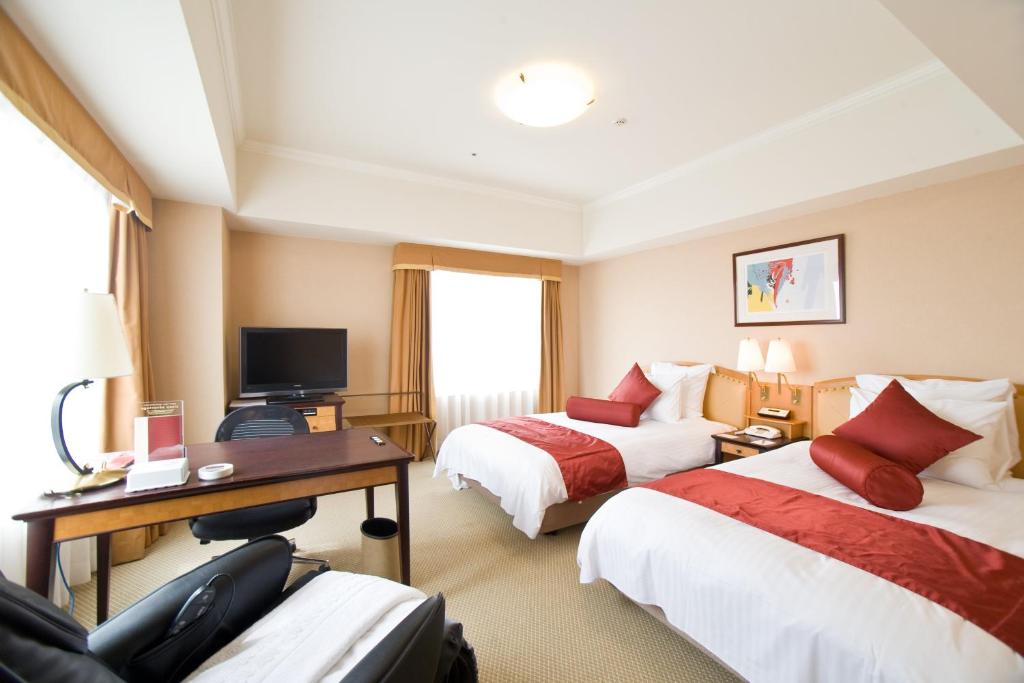 غرفة بريميوم بسريرين منفصلين في طابق مرتفع، Ana Crowne Plaza Hotel Toyama 2/5