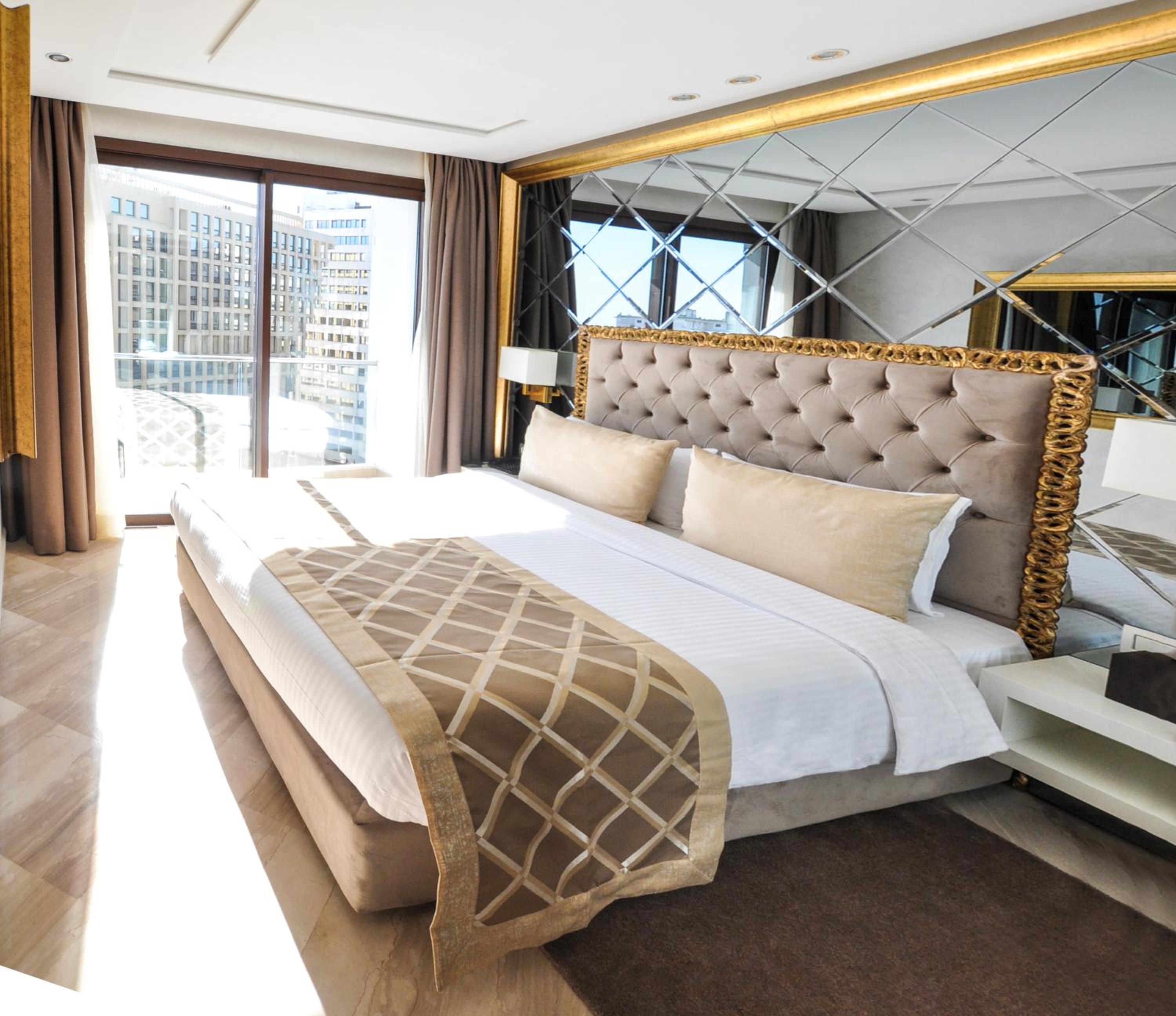 جناح جونيور كلاسيكي بسرير كينج وسرير كوين مع أريكة، Suite Hotel Casa Diamond 2/14
