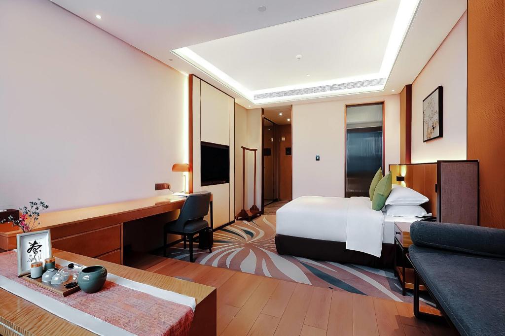 غرفة ديلوكس بسرير كينج، Ramada by Wyndham Leshan 5/8