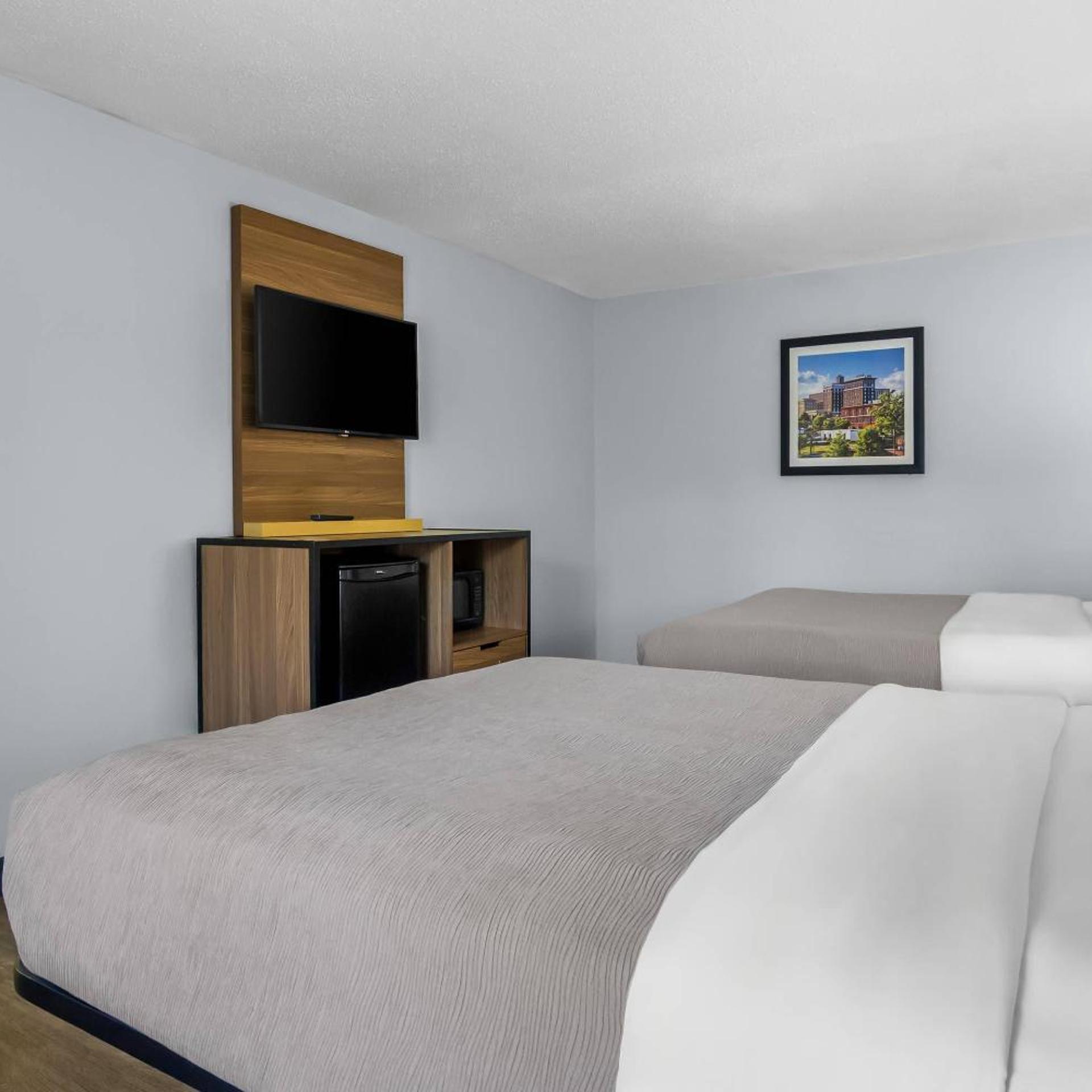 Suite, 2 Queen Beds, Living Area, Smoking, Quality Inn & Suites Greenville - Haywood Mall 2/3