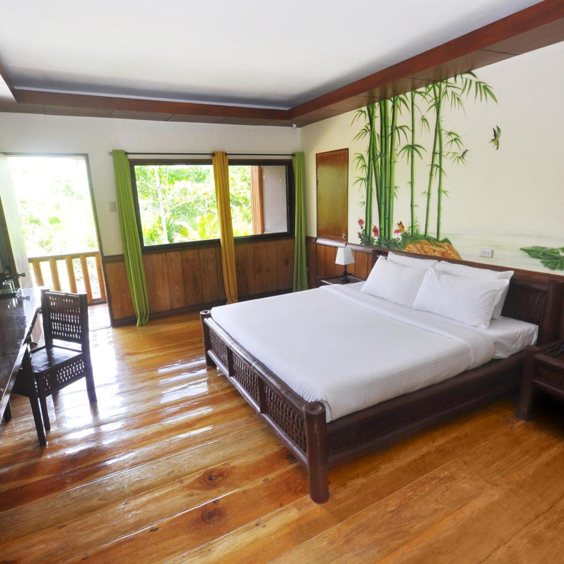 غرفة ديلوكس بسرير مزدوج أو سريرين منفصلين بإطلالة على الحديقة، Loboc River Resort 2/4