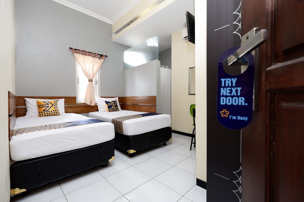 Hotel SUPER OYO 2209 Solo Point Guest House Syariah 16/31