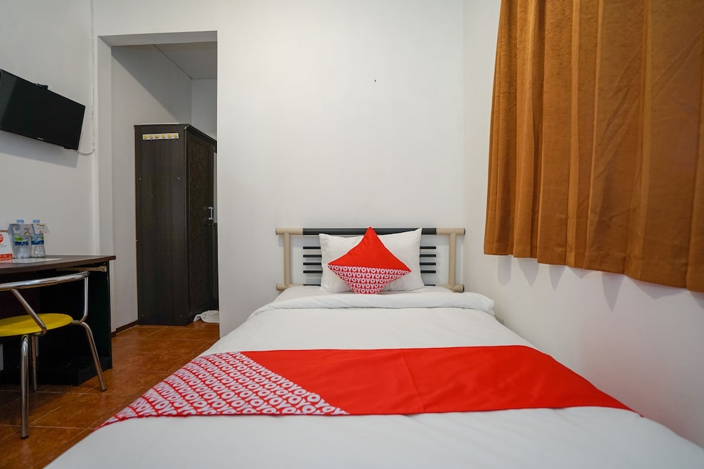 Super OYO 1844 Bravo Residence 16/39