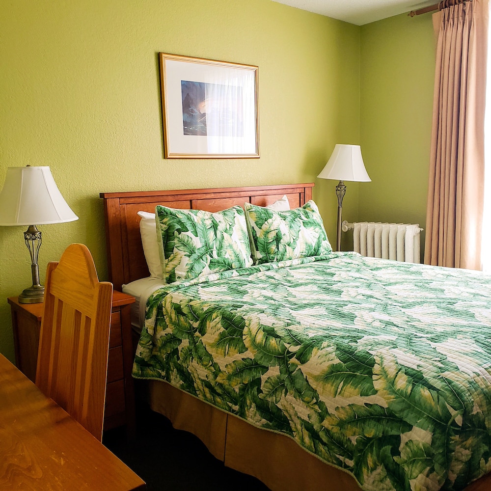 غرفة كلاسيكية بسرير كوين، James Bay Inn Hotel Suites Cottage 3/7