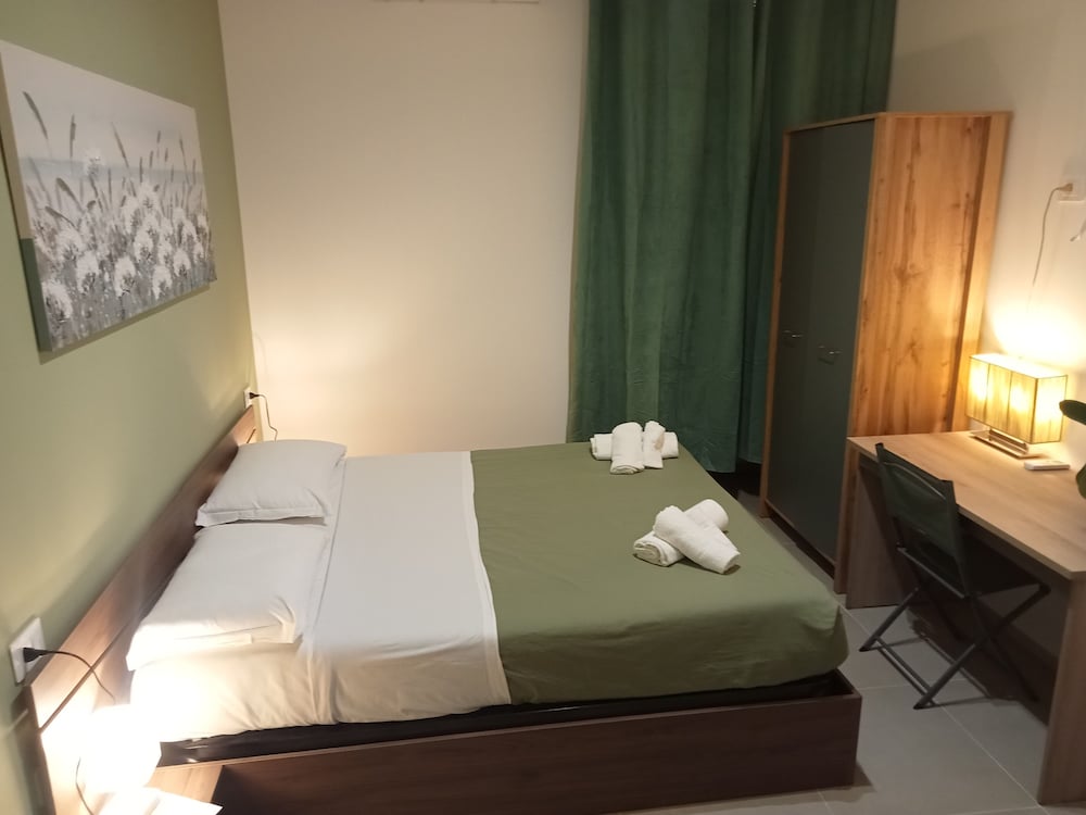 شقة سكنية فاخرة بأربعة أسرّة وسريرين كوين مع أريكة، Deluxe Rooms 2/9