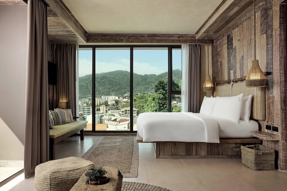 جناح ركني بسرير كينج وسريرين منفصلين بغرفتي نوم، Dinso Resort 2/7