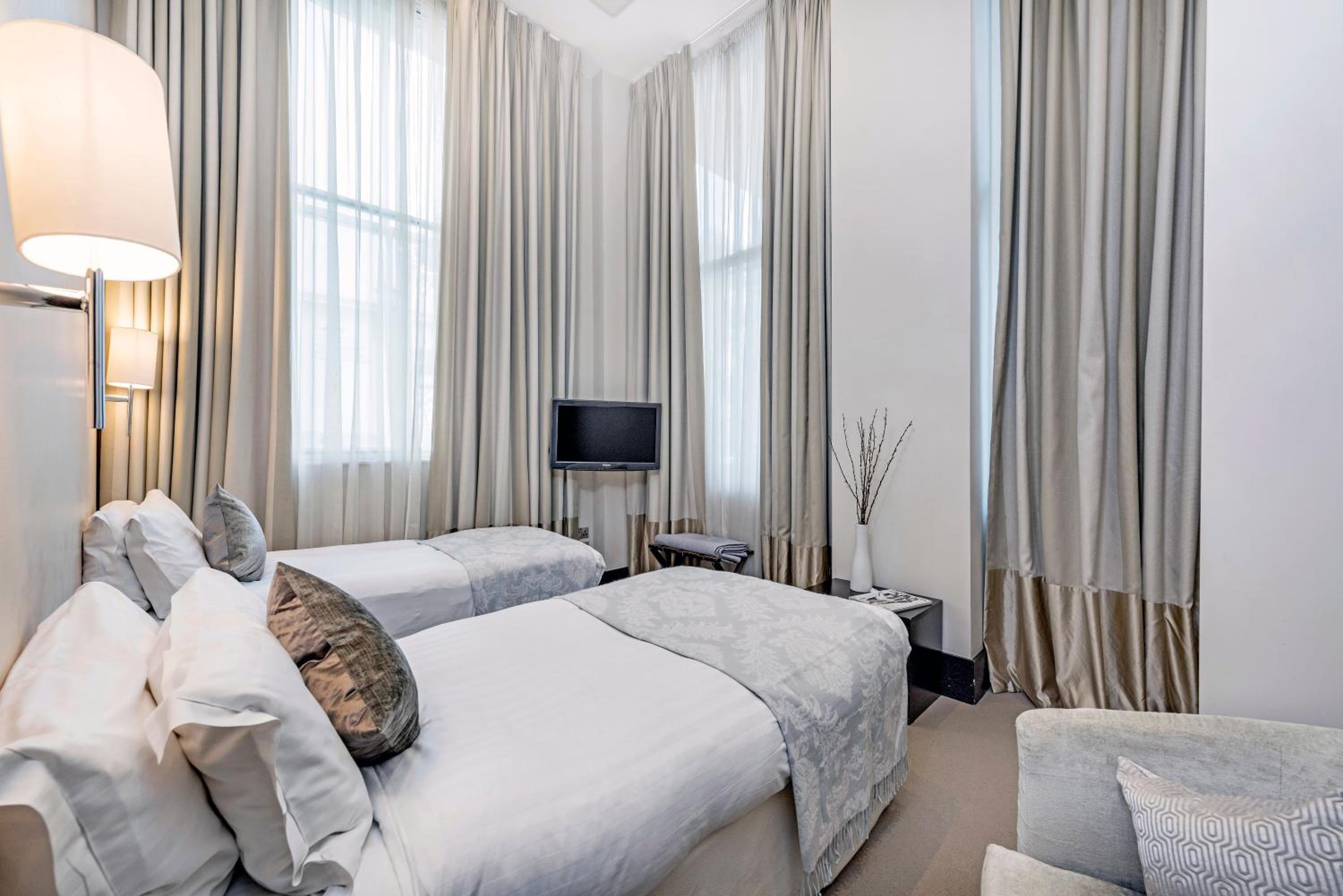شقة ديلوكس بسرير كينج بغرفتي نوم، 130 Queensgate Apartments 5/10
