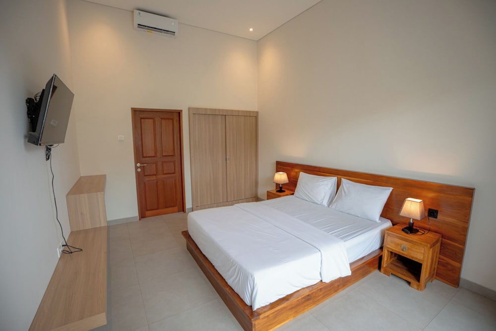 غرفة ديلوكس بسرير كوين، Abimanyu Guest House 2/8