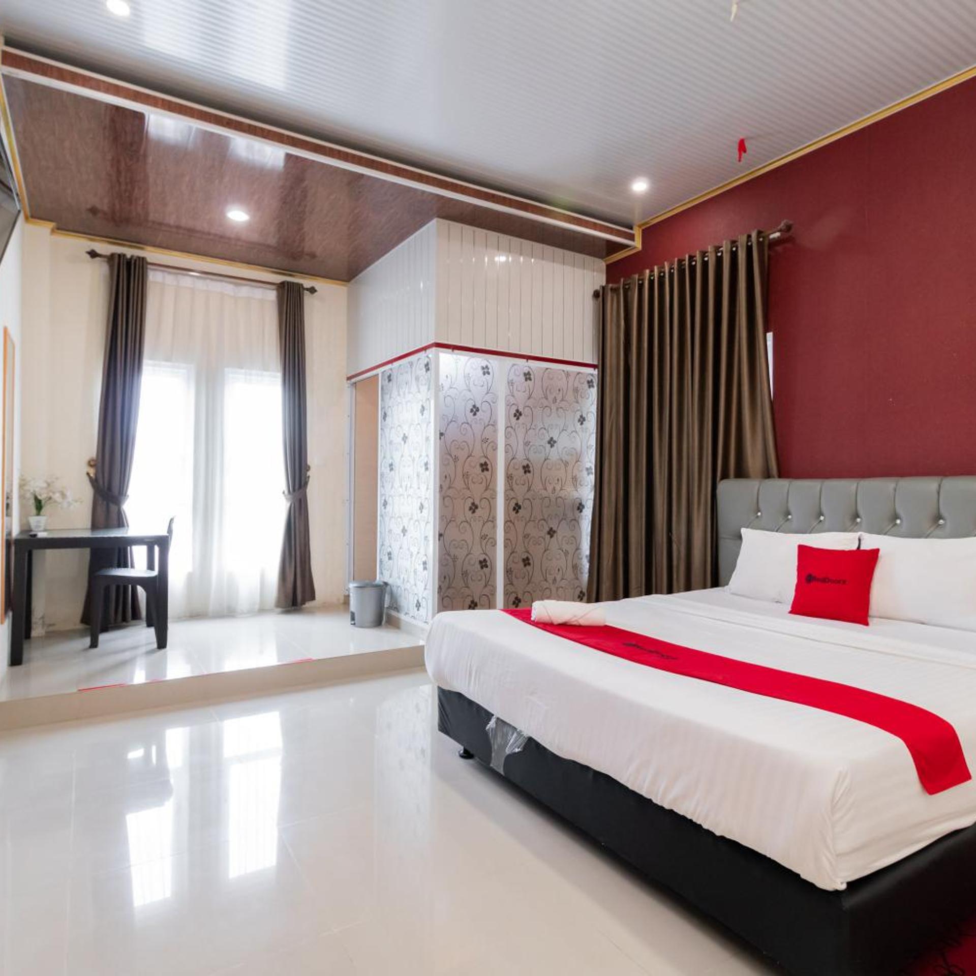 OYO 1648 Penginapan Three Joye 12/47
