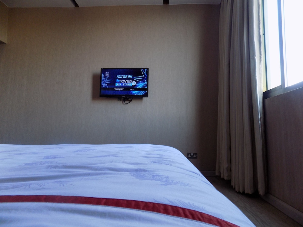 Room at Freedom City Hotel, KAMPALA