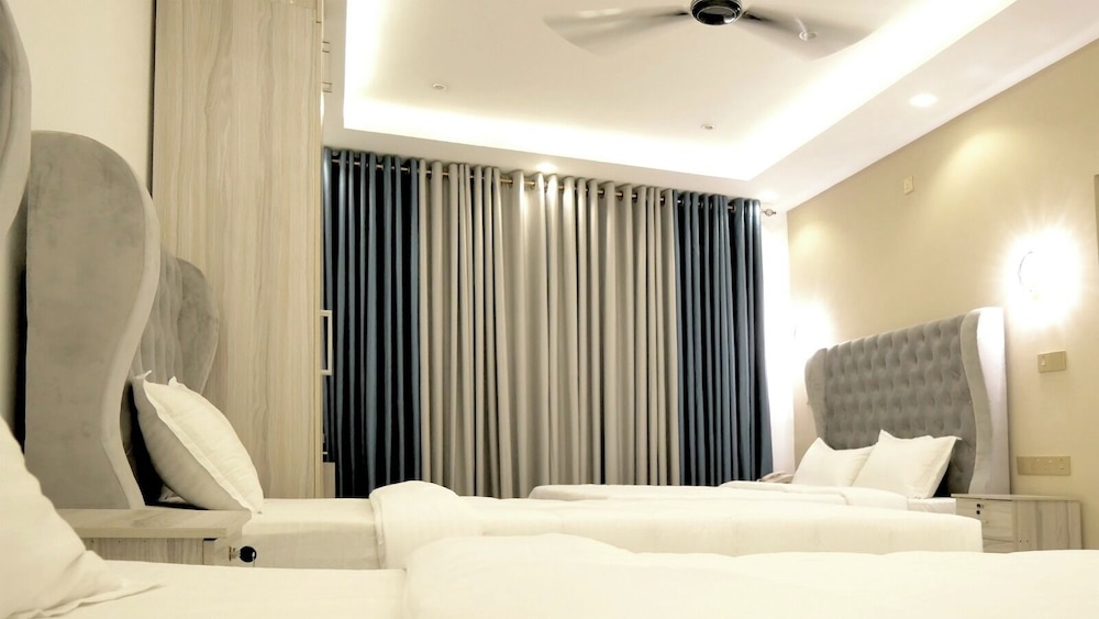 غرفة ملكية رباعية بسرير كينج، Nine Arch Holiday Resort 2/10