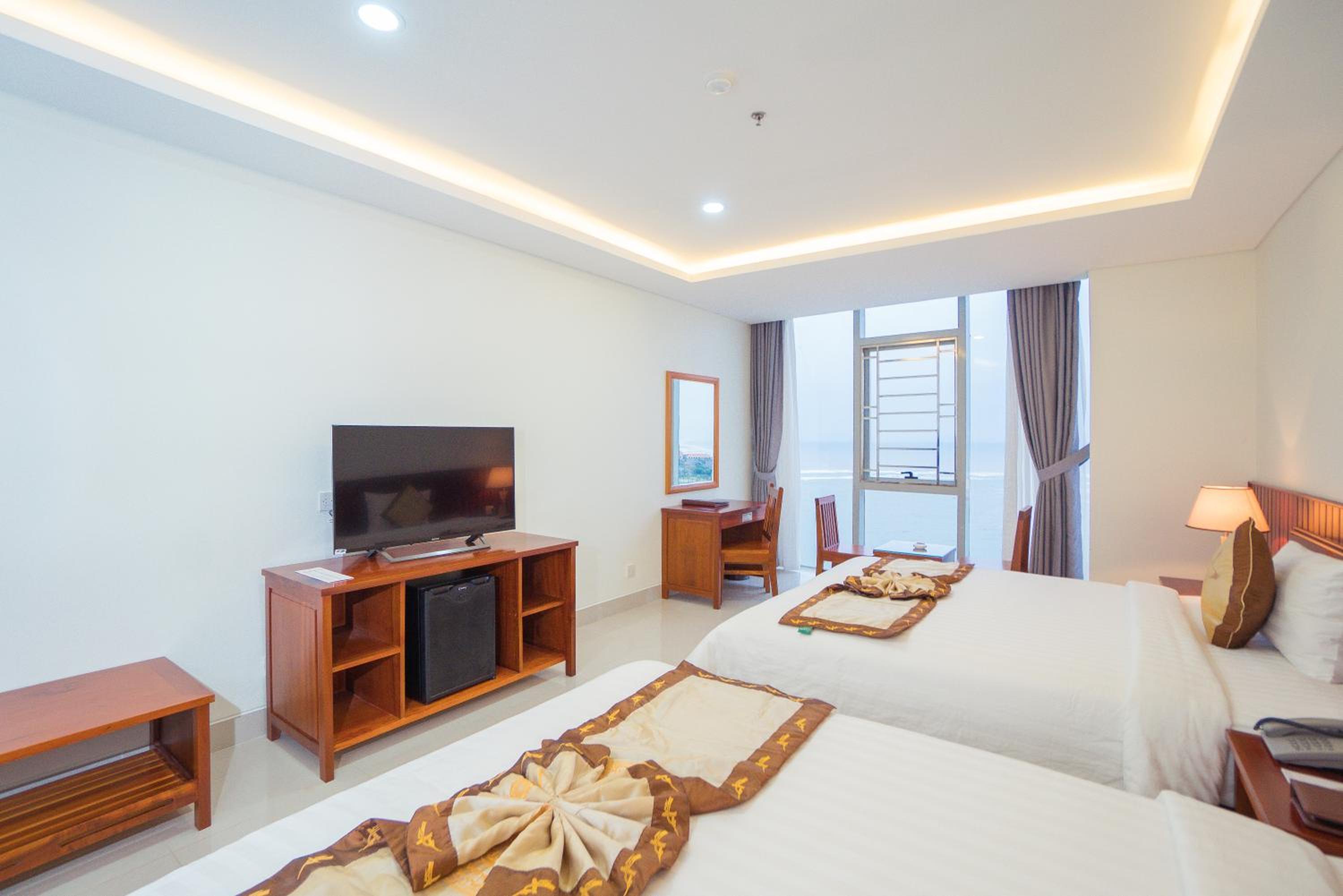 غرفة ديلوكس رباعية، Vinh Hoang Hotel 2/2