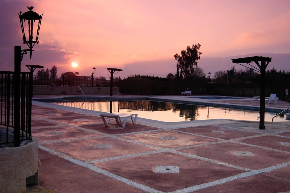 El Cortijo 18/50