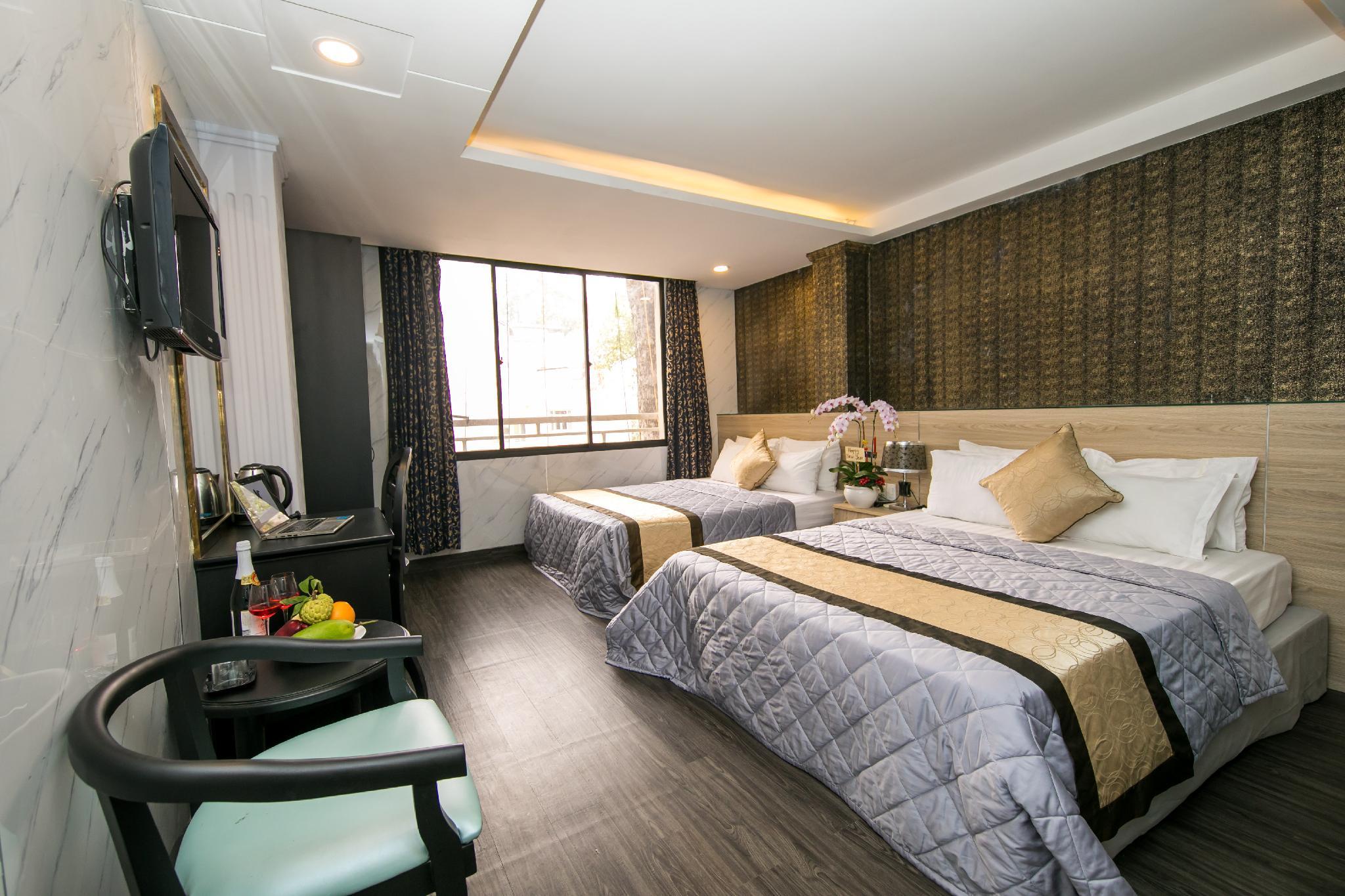 Deluxe, Triple, 1 Double and 1 Single Bed
