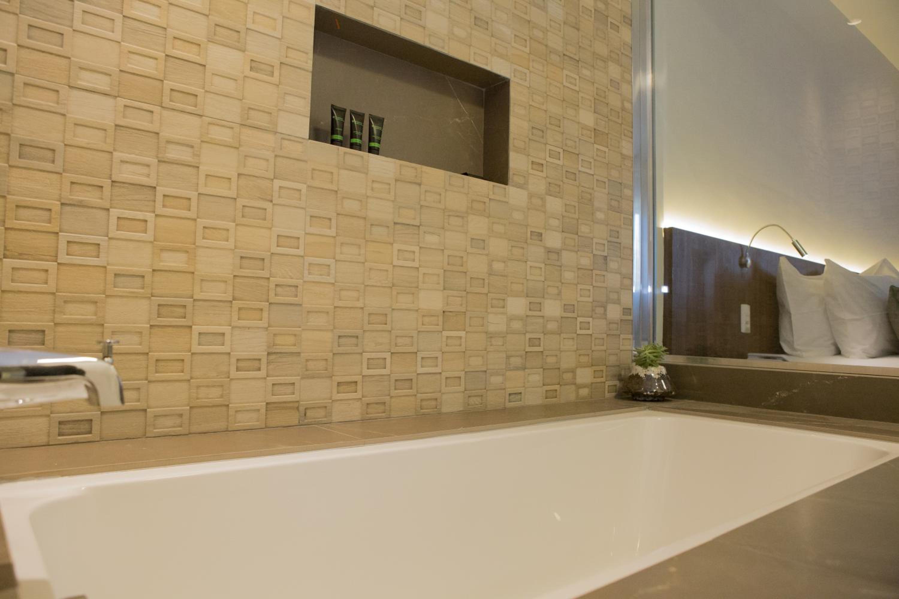 غرفة بريميوم بسرير كينج وسرير كوين، Wyndham Garden Ribeirao Preto Convention 4/4