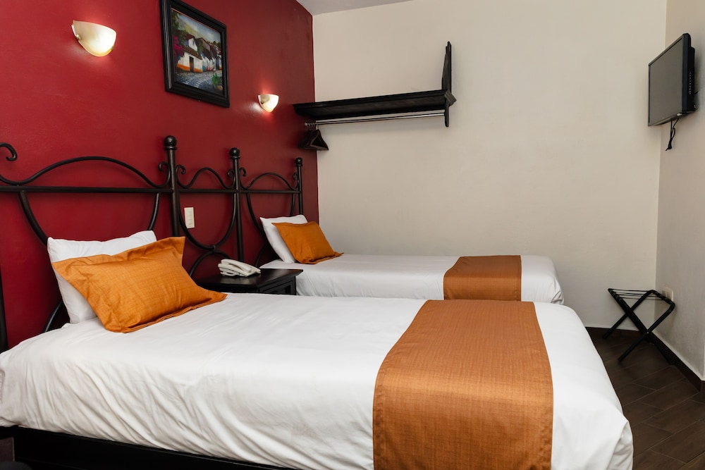 Hotel Plaza Poblana 23/67