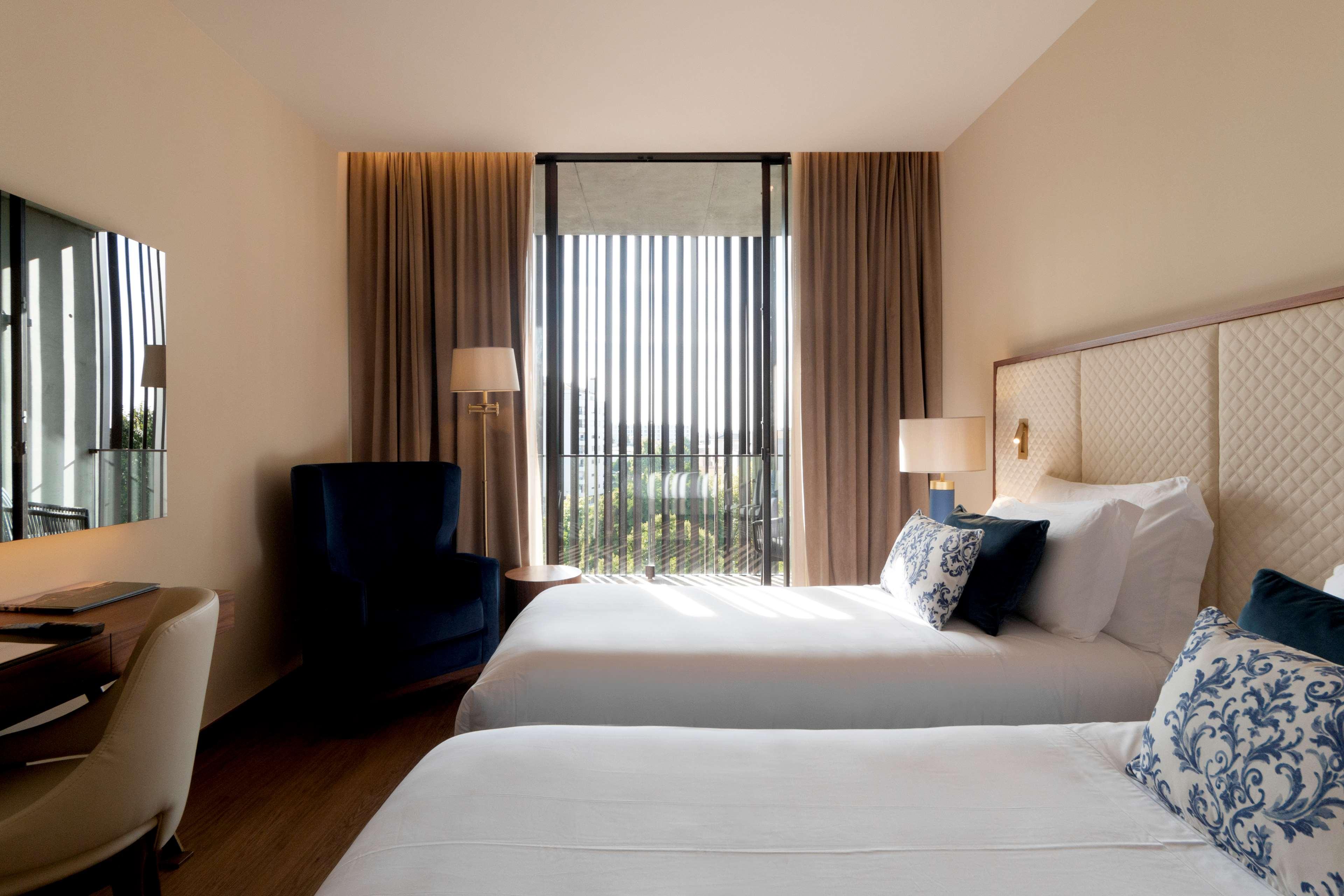 DELUXE, KING BED, FRENCH BALCONY