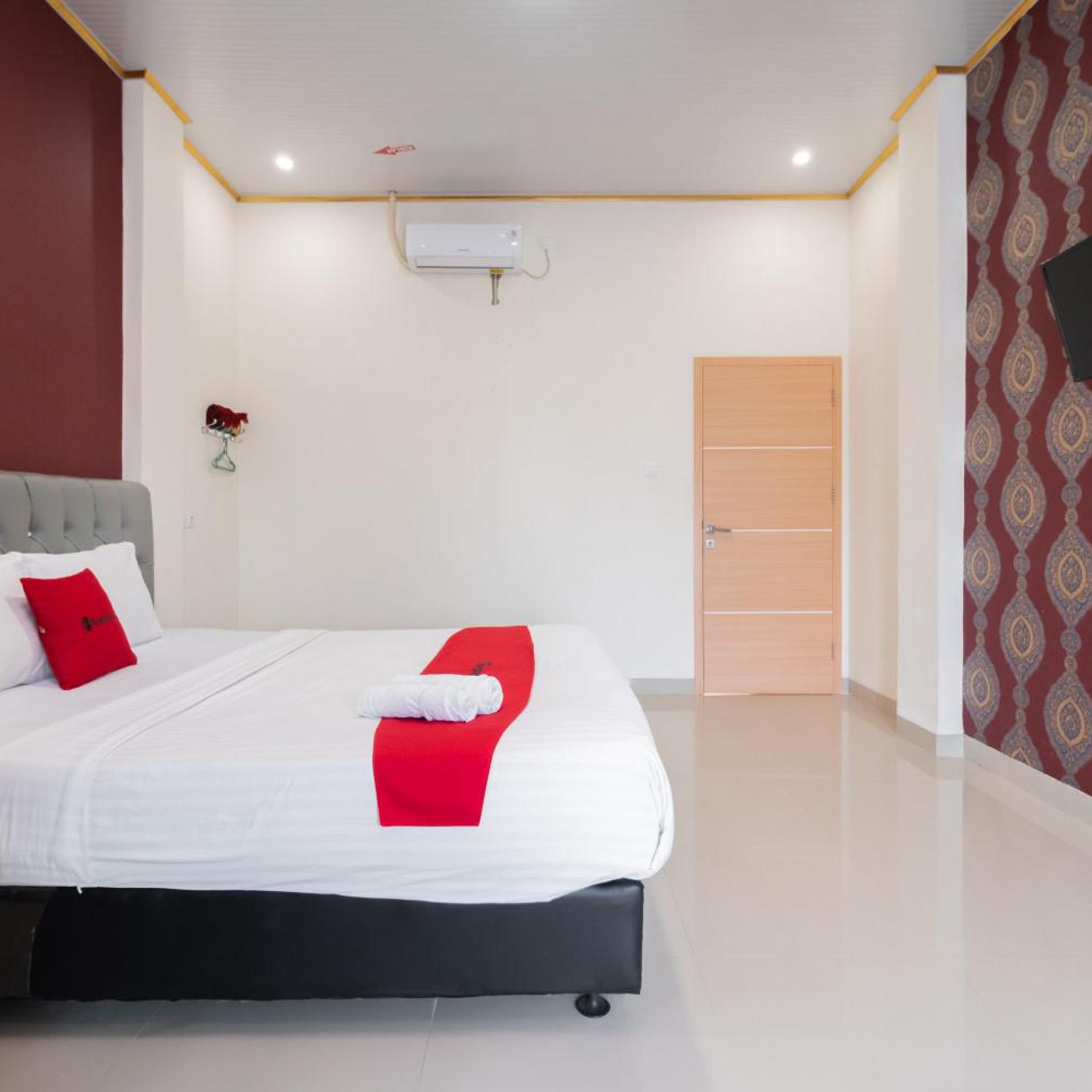 OYO 1648 Penginapan Three Joye 22/47