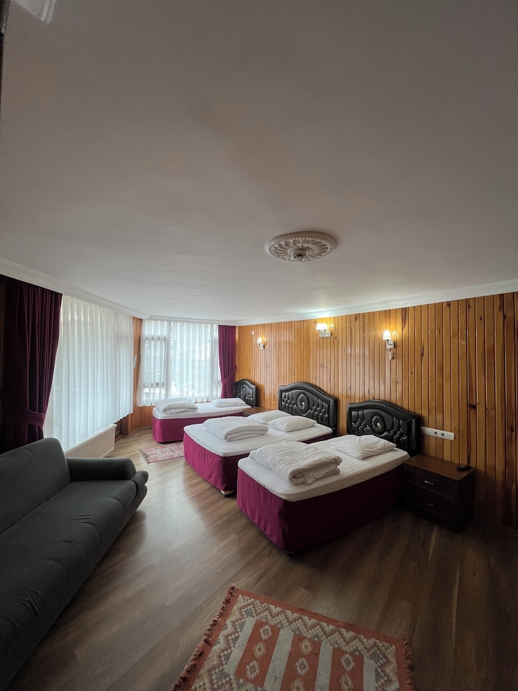 Family, 1 Double and 3 Single Beds