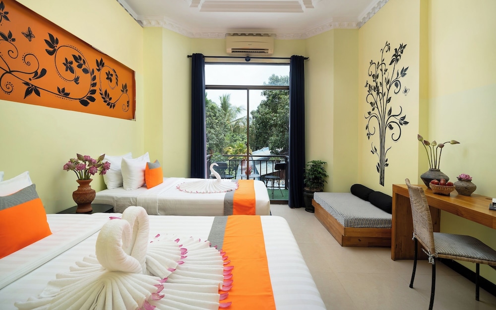 غرفة ديلوكس عائلية بسرير كينج وسرير فردي بشرفة، Central Indochine D Angkor Hotel 4/10