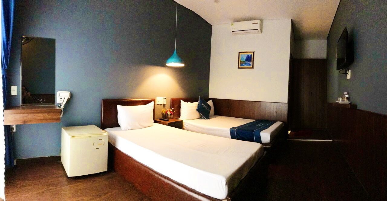 غرفة قياسية ثلاثية بسرير مزدوج وسرير فردي بإطلالة على الحديقة، QUAN QUAN HOTEL 4/8
