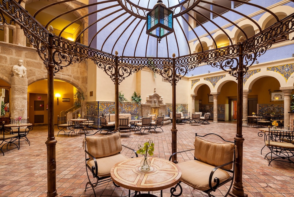 Ilunion Merida Palace Hotel 58/66