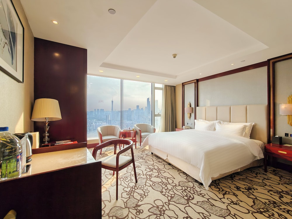 DELUXE, KING BED, RIVER AND TOWER VIEW
