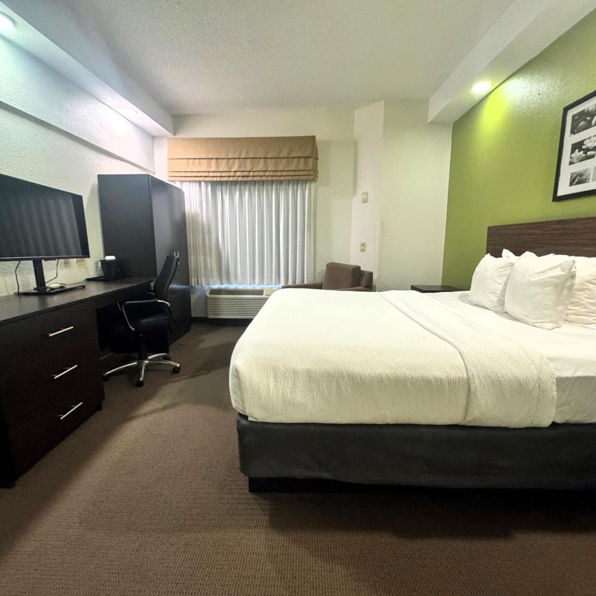 جناح بسرير كينج بغرفة نوم واحدة، Travelodge by Wyndham Flowood 4/9