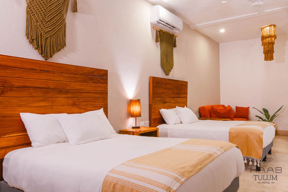 جناح جونيور بسرير كينج وسريرين كينج وسرير بطابقين بإطلالة على المسبح مع أريكة، Collection O Kaab Downtown Tulum 5/10