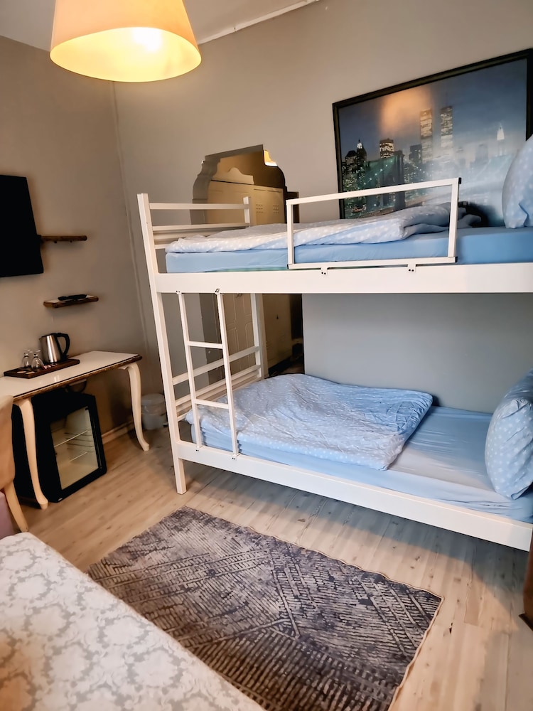 غرفة عائلية رباعية بسرير كوين وأسرّة بطابقين مع أريكة، Chez Bore Boutique Hotel 5/10
