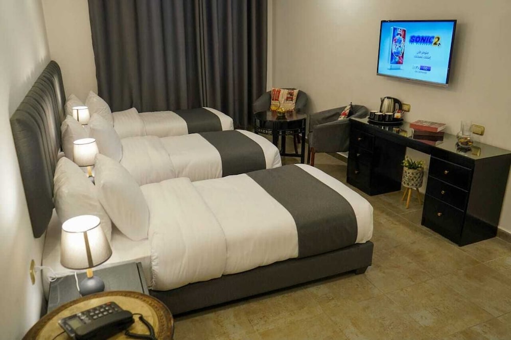 RUM HOTELS - AL WALEED 15/66