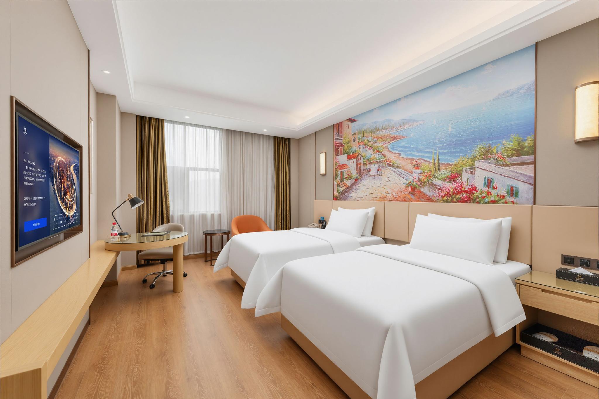 Vienna International Hotel (Huanggang Normal College Ruitian Plaza) 23/39