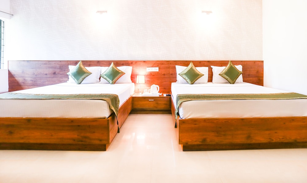 Itsy By Treebo - Comforts Inn, University Road Deralakatte 4/24
