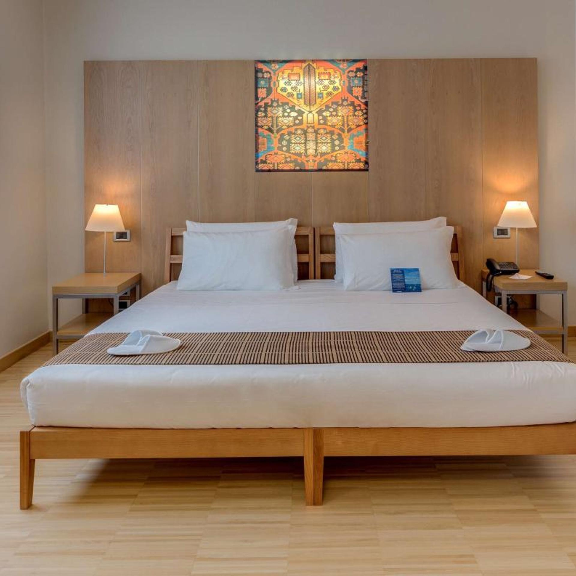 غرفة كلاسيكية بسرير فردي وسرير كوين، Best Western Plus Hotel Bologna 9/11