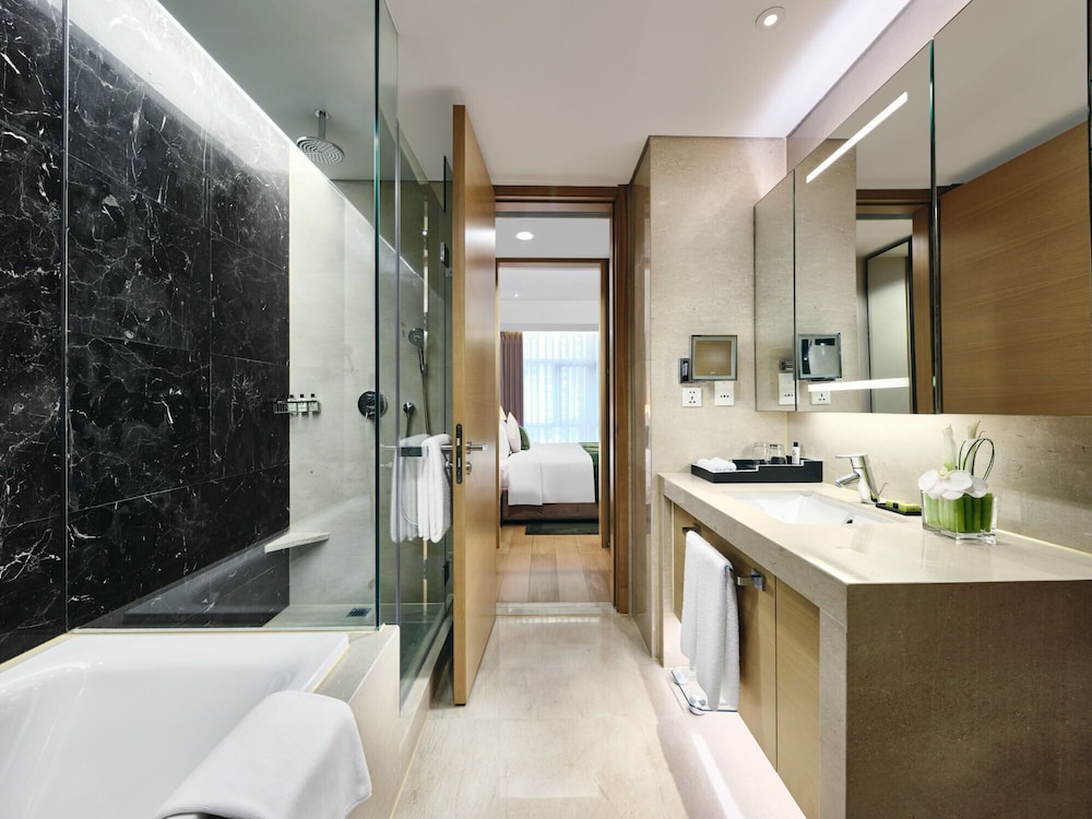 غرفة ديلوكس بسريرين منفصلين، Grand ParcVue Hotel Residence Chengdu 3/5