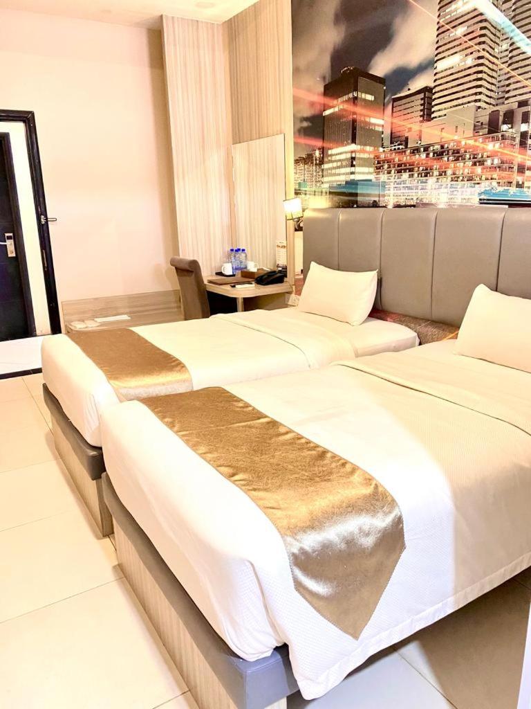 غرفة بسريرين منفصلين، OS Hotel Tanjung Uncang Batam 3/5
