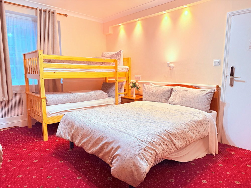 Family, 1 Double and 3 Single Beds