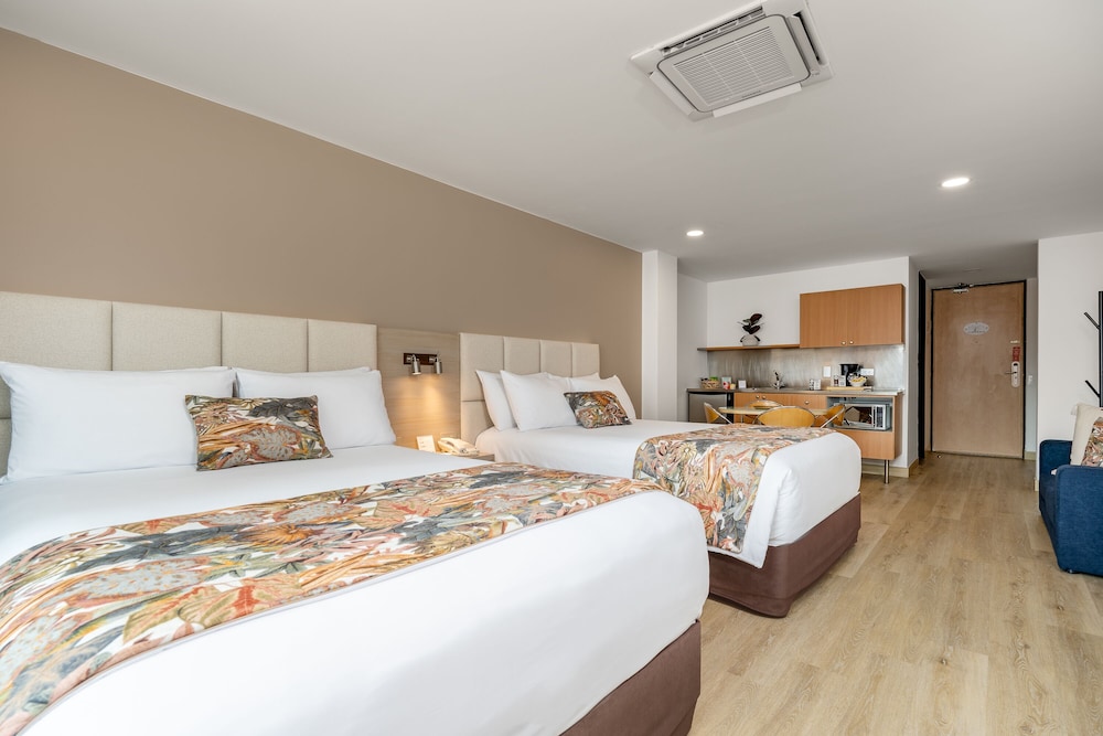 Novelty Suites Hotel 24/77