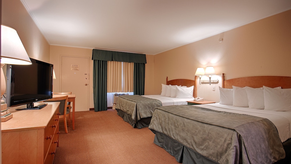 Magnuson Grand Pioneer Inn And Suites 15/48