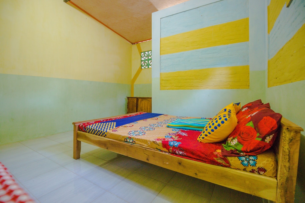 SPOT ON 1762 Gandrung Payungan Family Inn 10/26