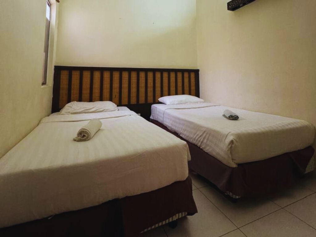 شقة بسريرين منفصلين بغرفتين