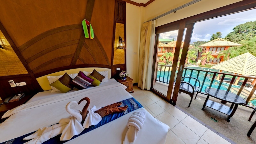 DELUXE ROOM WITH BALCONY AND POOL VIEW