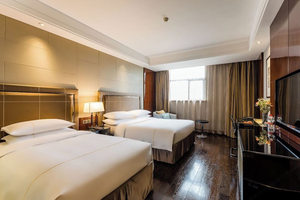 غرفة سوبيريور ثلاثية بسرير كوين وسرير فردي، Maixinge International Hotel 4/8