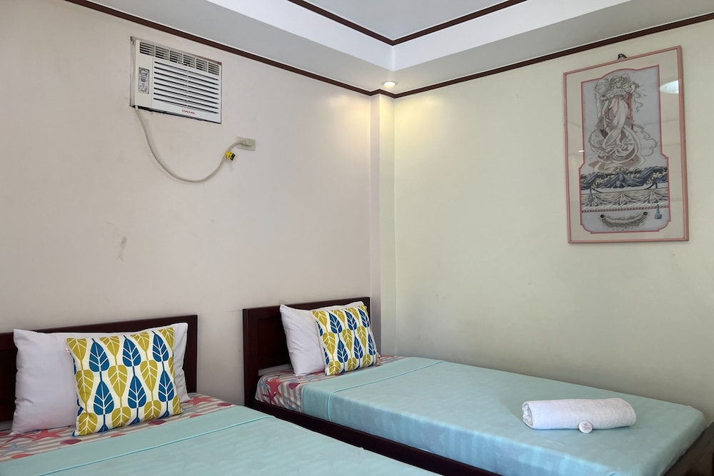 Dinah's Tourist Inn Puerto Princesa by ZUZU 53/63
