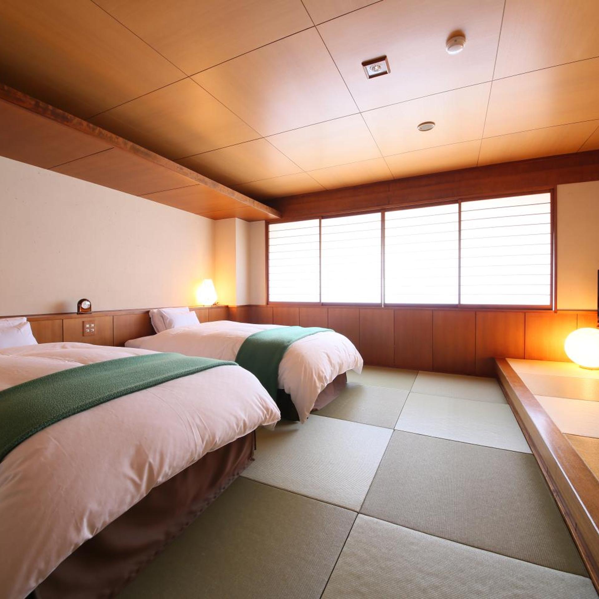 غرفة بسريرين منفصلين بأرضية تاتامي، Hotel Tamanoyu 7/10