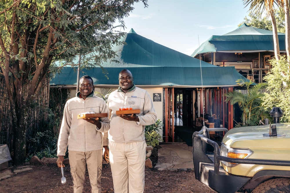 OLARE MARA KEMPINSKI MASAI MARA 44/50