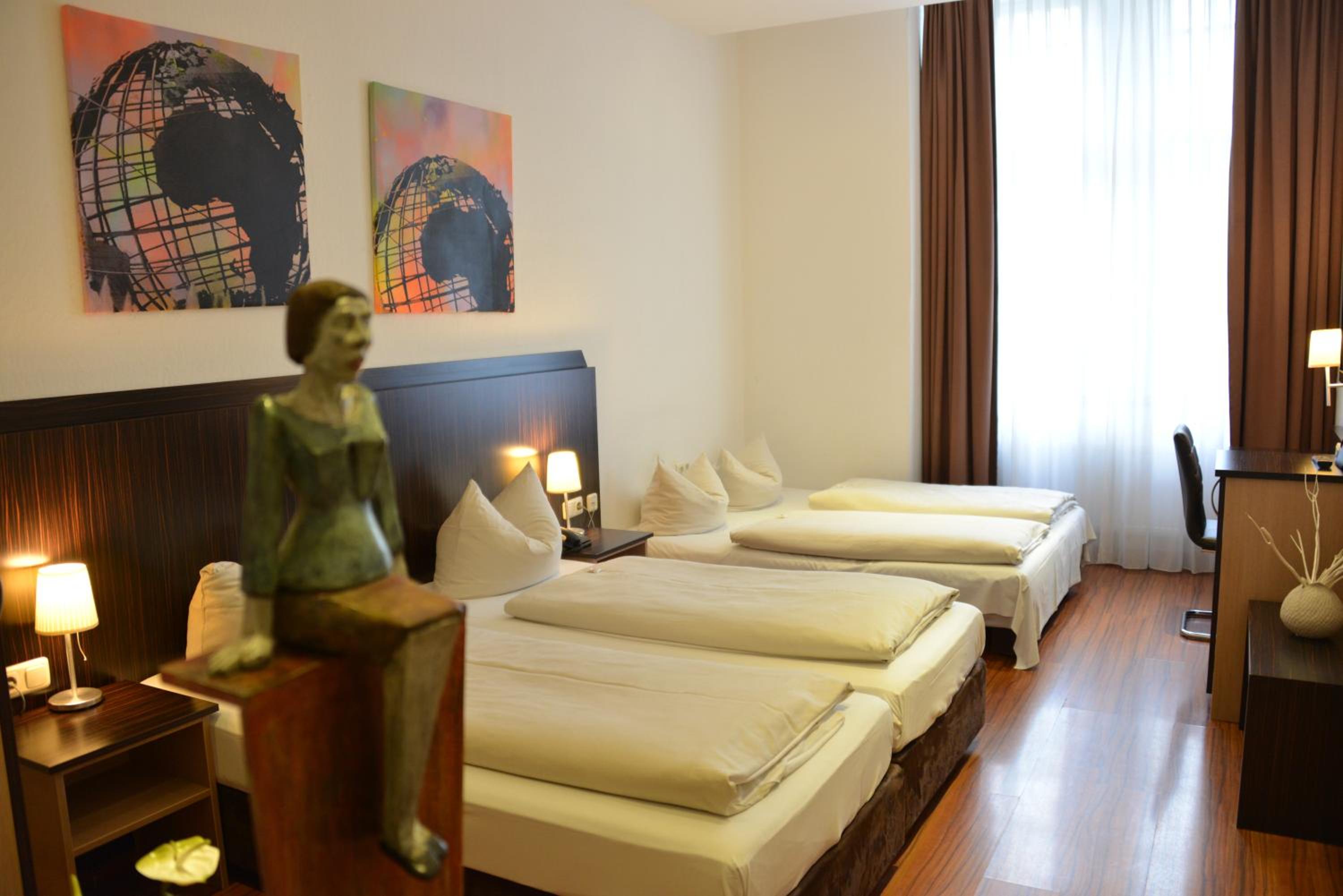 غرفة رباعية بسرير فردي، Arthotel Munich 7/10